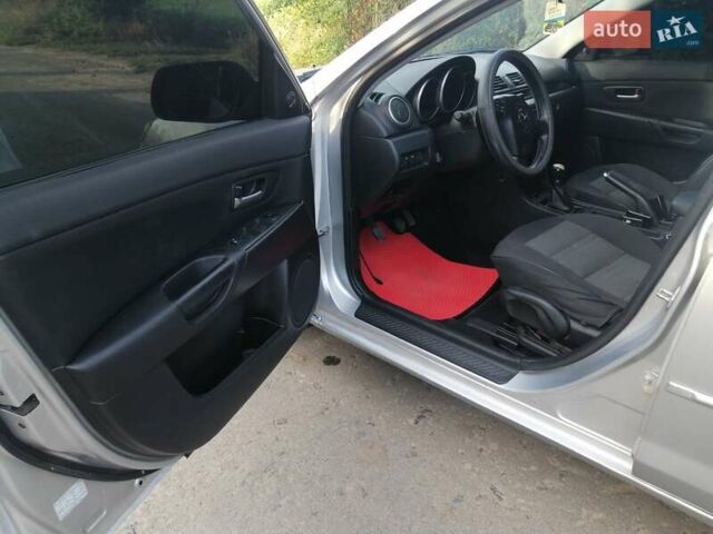 Сірий Мазда 3, об'ємом двигуна 1.6 л та пробігом 283 тис. км за 3650 $, фото 16 на Automoto.ua