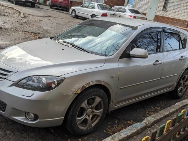 Сірий Мазда 3, об'ємом двигуна 2 л та пробігом 145 тис. км за 3999 $, фото 12 на Automoto.ua