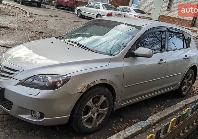 Серый Мазда 3, объемом двигателя 2 л и пробегом 145 тыс. км за 3999 $, фото 12 на Automoto.ua