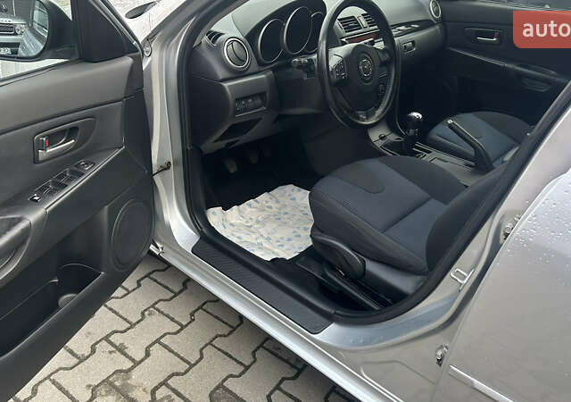 Серый Мазда 3, объемом двигателя 1.6 л и пробегом 202 тыс. км за 4400 $, фото 10 на Automoto.ua