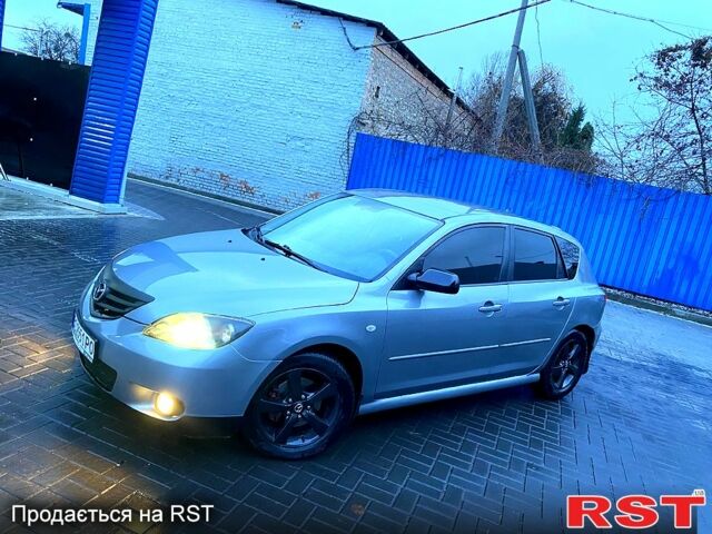 Сірий Мазда 3, об'ємом двигуна 1.6 л та пробігом 205 тис. км за 4500 $, фото 2 на Automoto.ua