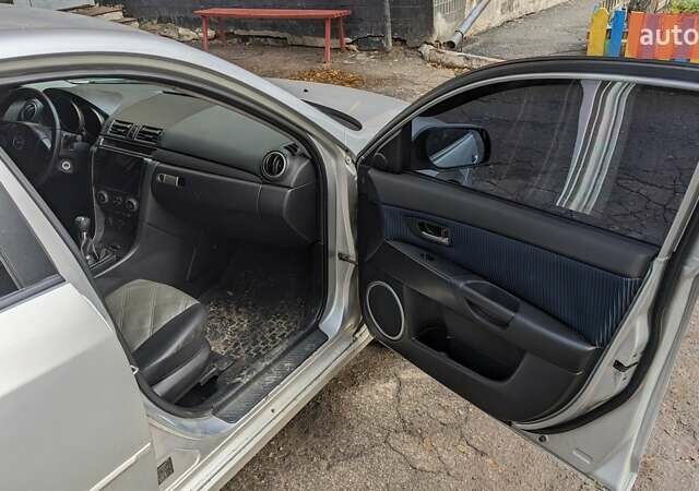 Серый Мазда 3, объемом двигателя 2 л и пробегом 145 тыс. км за 3999 $, фото 16 на Automoto.ua