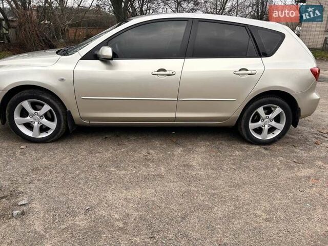 Сірий Мазда 3, об'ємом двигуна 1.6 л та пробігом 250 тис. км за 4300 $, фото 1 на Automoto.ua