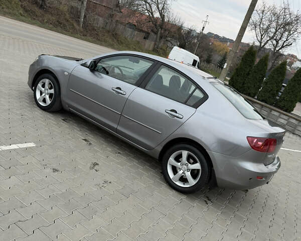 Серый Мазда 3, объемом двигателя 1.6 л и пробегом 222 тыс. км за 3599 $, фото 7 на Automoto.ua