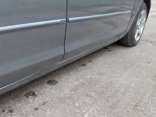 Сірий Мазда 3, об'ємом двигуна 1.6 л та пробігом 244 тис. км за 4500 $, фото 4 на Automoto.ua