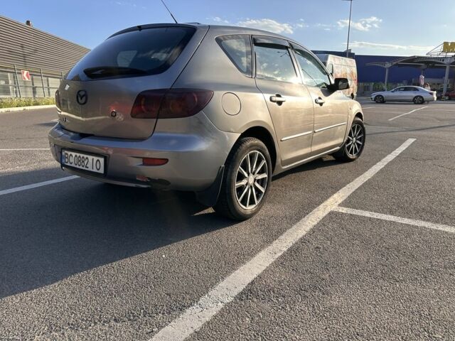 Серый Мазда 3, объемом двигателя 2 л и пробегом 240 тыс. км за 3518 $, фото 3 на Automoto.ua
