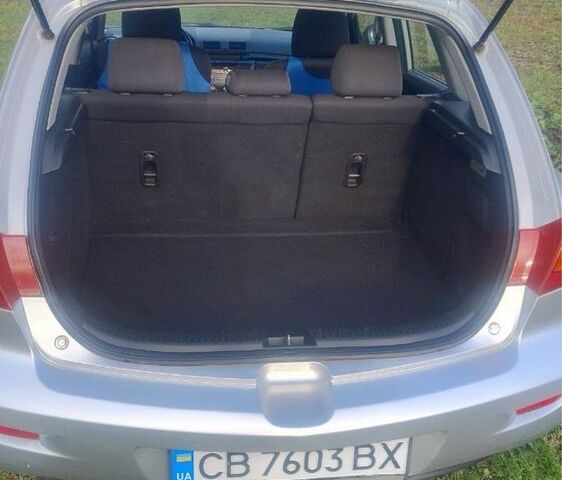 Сірий Мазда 3, об'ємом двигуна 1.6 л та пробігом 187 тис. км за 4000 $, фото 4 на Automoto.ua