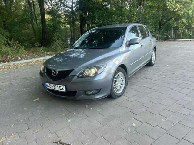 Серый Мазда 3, объемом двигателя 1.6 л и пробегом 320 тыс. км за 3317 $, фото 7 на Automoto.ua