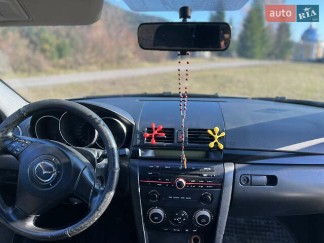 Серый Мазда 3, объемом двигателя 1.56 л и пробегом 170 тыс. км за 2450 $, фото 6 на Automoto.ua