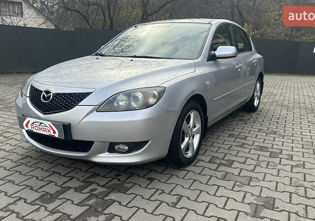 Серый Мазда 3, объемом двигателя 1.6 л и пробегом 202 тыс. км за 4400 $, фото 1 на Automoto.ua