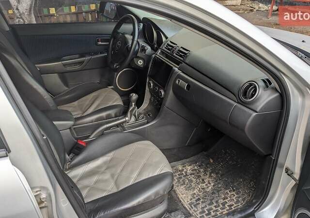 Серый Мазда 3, объемом двигателя 2 л и пробегом 145 тыс. км за 3999 $, фото 17 на Automoto.ua