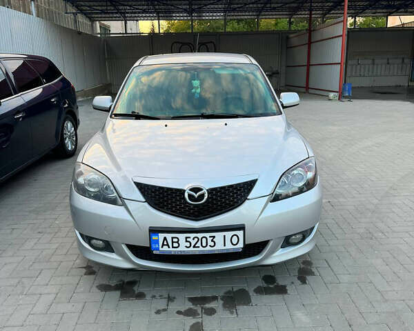 Серый Мазда 3, объемом двигателя 1.6 л и пробегом 229 тыс. км за 4000 $, фото 3 на Automoto.ua
