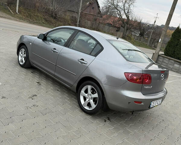 Серый Мазда 3, объемом двигателя 1.6 л и пробегом 222 тыс. км за 3599 $, фото 8 на Automoto.ua