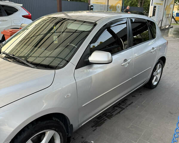 Серый Мазда 3, объемом двигателя 1.56 л и пробегом 170 тыс. км за 4800 $, фото 5 на Automoto.ua