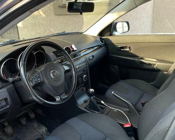 Серый Мазда 3, объемом двигателя 1.6 л и пробегом 215 тыс. км за 3800 $, фото 8 на Automoto.ua