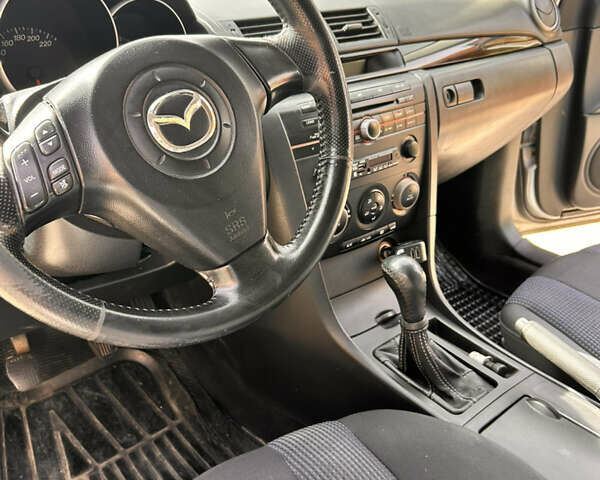 Сірий Мазда 3, об'ємом двигуна 1.56 л та пробігом 320 тис. км за 3950 $, фото 13 на Automoto.ua