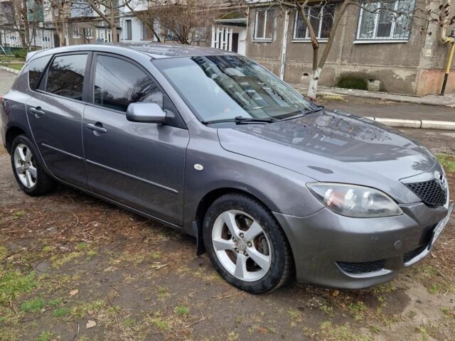 Серый Мазда 3, объемом двигателя 2 л и пробегом 203 тыс. км за 5200 $, фото 2 на Automoto.ua