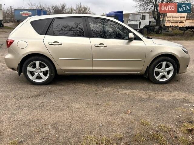 Сірий Мазда 3, об'ємом двигуна 1.6 л та пробігом 250 тис. км за 4300 $, фото 2 на Automoto.ua