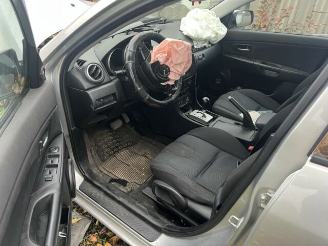 Серый Мазда 3, объемом двигателя 1.6 л и пробегом 220 тыс. км за 1250 $, фото 4 на Automoto.ua