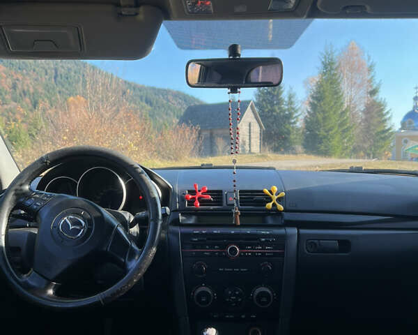 Серый Мазда 3, объемом двигателя 1.56 л и пробегом 170 тыс. км за 2450 $, фото 10 на Automoto.ua