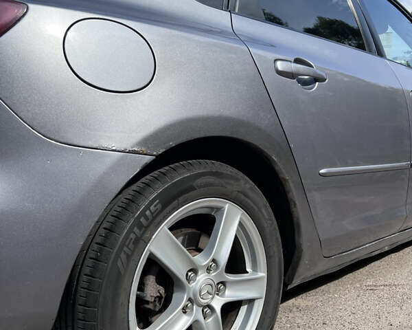 Сірий Мазда 3, об'ємом двигуна 1.6 л та пробігом 244 тис. км за 3700 $, фото 37 на Automoto.ua