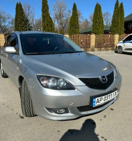 Серый Мазда 3, объемом двигателя 1.6 л и пробегом 269 тыс. км за 4750 $, фото 1 на Automoto.ua