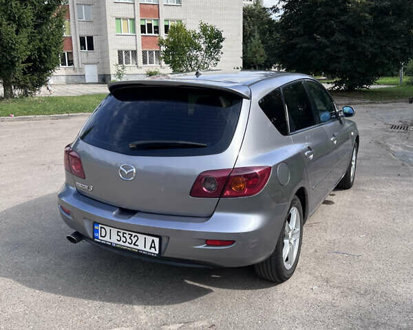 Сірий Мазда 3, об'ємом двигуна 1.6 л та пробігом 244 тис. км за 3700 $, фото 3 на Automoto.ua