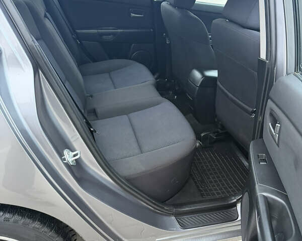 Серый Мазда 3, объемом двигателя 1.6 л и пробегом 222 тыс. км за 3599 $, фото 27 на Automoto.ua