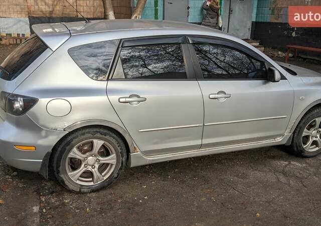 Серый Мазда 3, объемом двигателя 2 л и пробегом 145 тыс. км за 3999 $, фото 13 на Automoto.ua