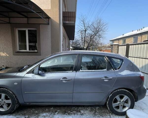 Серый Мазда 3, объемом двигателя 1.6 л и пробегом 215 тыс. км за 3800 $, фото 1 на Automoto.ua
