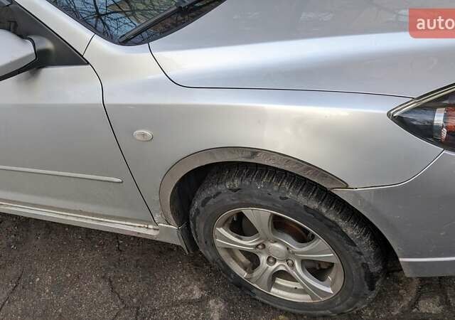 Серый Мазда 3, объемом двигателя 2 л и пробегом 145 тыс. км за 3999 $, фото 7 на Automoto.ua