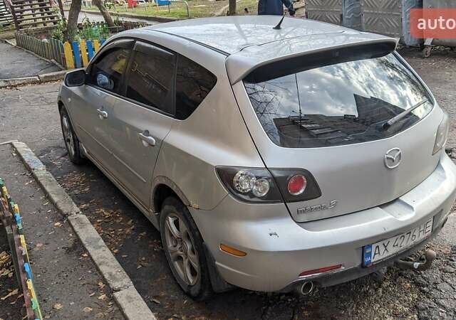 Серый Мазда 3, объемом двигателя 2 л и пробегом 145 тыс. км за 3999 $, фото 9 на Automoto.ua