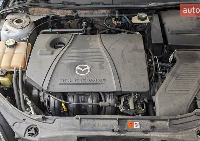 Серый Мазда 3, объемом двигателя 2 л и пробегом 145 тыс. км за 3999 $, фото 4 на Automoto.ua