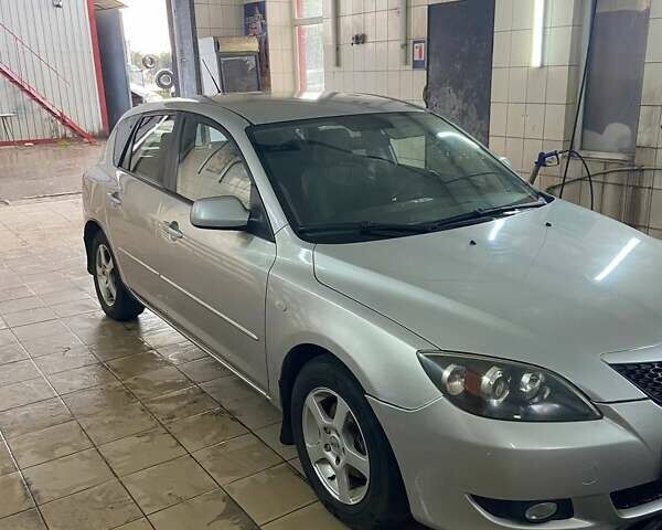 Серый Мазда 3, объемом двигателя 1.3 л и пробегом 189 тыс. км за 3700 $, фото 3 на Automoto.ua
