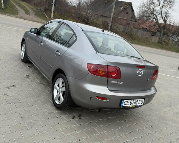 Серый Мазда 3, объемом двигателя 1.6 л и пробегом 222 тыс. км за 3599 $, фото 9 на Automoto.ua