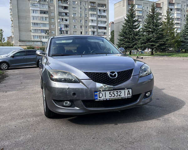 Сірий Мазда 3, об'ємом двигуна 1.6 л та пробігом 244 тис. км за 3700 $, фото 8 на Automoto.ua