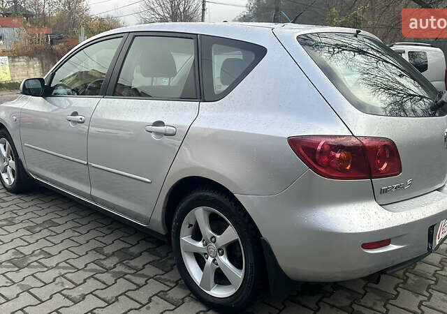 Серый Мазда 3, объемом двигателя 1.6 л и пробегом 202 тыс. км за 4400 $, фото 3 на Automoto.ua