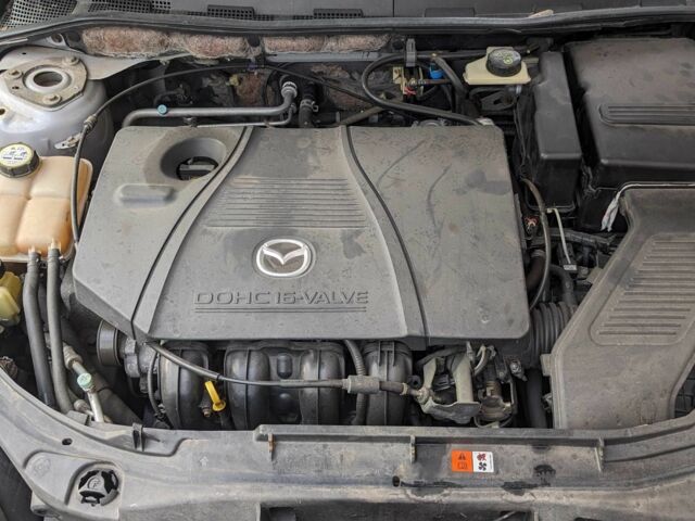 Сірий Мазда 3, об'ємом двигуна 2 л та пробігом 145 тис. км за 3999 $, фото 4 на Automoto.ua