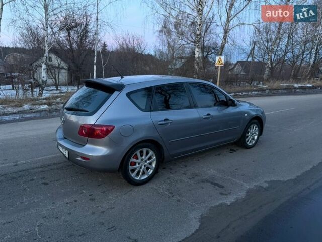 Серый Мазда 3, объемом двигателя 1.6 л и пробегом 244 тыс. км за 4299 $, фото 1 на Automoto.ua