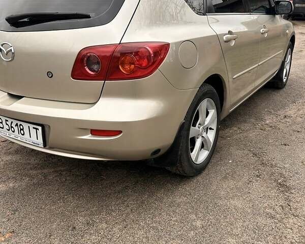 Сірий Мазда 3, об'ємом двигуна 1.6 л та пробігом 250 тис. км за 4300 $, фото 5 на Automoto.ua