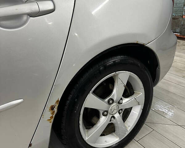 Сірий Мазда 3, об'ємом двигуна 1.6 л та пробігом 237 тис. км за 3400 $, фото 8 на Automoto.ua