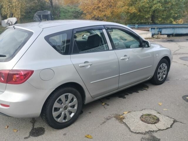 Серый Мазда 3, объемом двигателя 1.6 л и пробегом 320 тыс. км за 4400 $, фото 1 на Automoto.ua