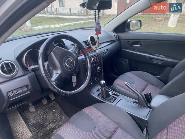 Сірий Мазда 3, об'ємом двигуна 1.6 л та пробігом 126 тис. км за 4200 $, фото 4 на Automoto.ua