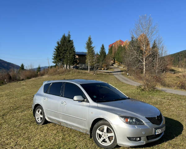 Серый Мазда 3, объемом двигателя 1.56 л и пробегом 170 тыс. км за 2450 $, фото 1 на Automoto.ua