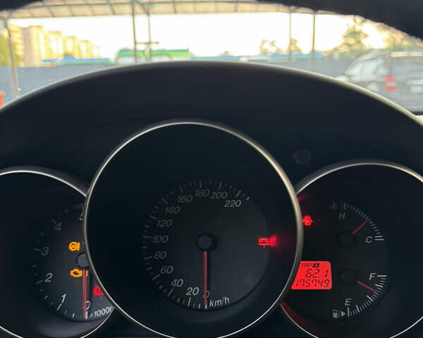 Серый Мазда 3, объемом двигателя 1.56 л и пробегом 170 тыс. км за 4800 $, фото 19 на Automoto.ua