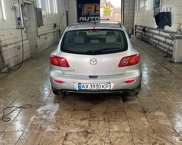 Серый Мазда 3, объемом двигателя 1.3 л и пробегом 189 тыс. км за 3700 $, фото 2 на Automoto.ua