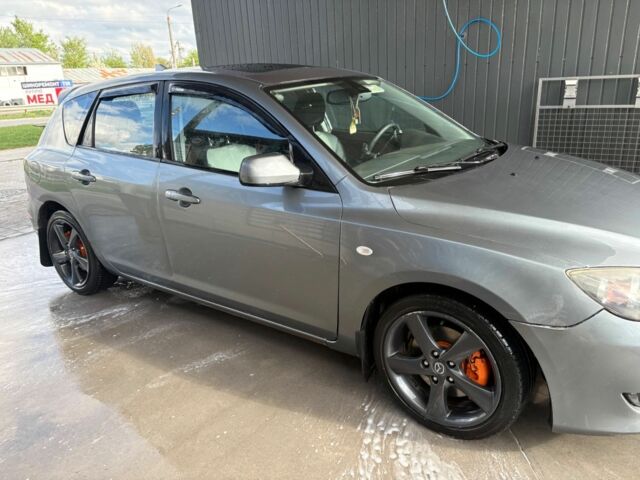 Сірий Мазда 3, об'ємом двигуна 2.3 л та пробігом 283 тис. км за 2600 $, фото 7 на Automoto.ua