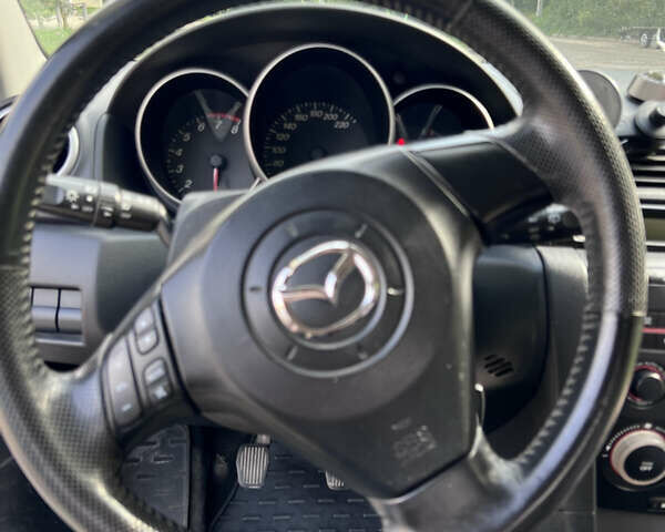 Сірий Мазда 3, об'ємом двигуна 1.6 л та пробігом 244 тис. км за 3700 $, фото 19 на Automoto.ua