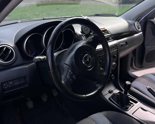 Сірий Мазда 3, об'ємом двигуна 1.6 л та пробігом 244 тис. км за 3700 $, фото 18 на Automoto.ua
