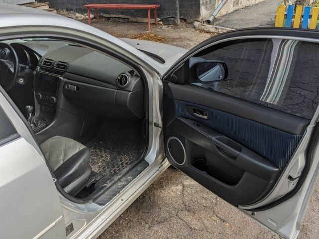 Сірий Мазда 3, об'ємом двигуна 2 л та пробігом 145 тис. км за 3999 $, фото 16 на Automoto.ua